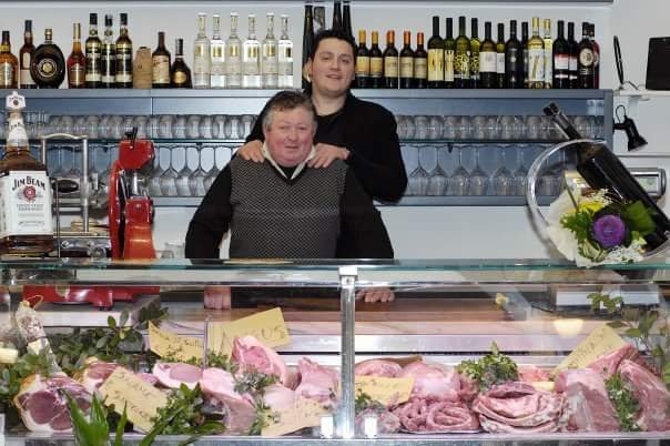 Manuel and Lorenzo at the counter of their first restaurant-butcher shop — Chez Bastianin